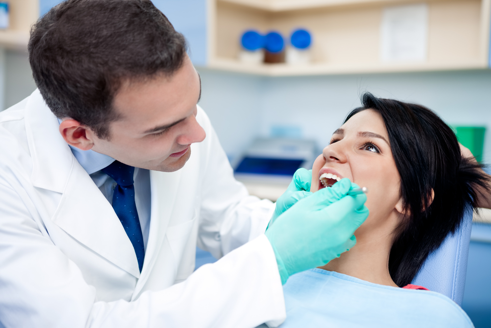 Woman receiving dental treatment